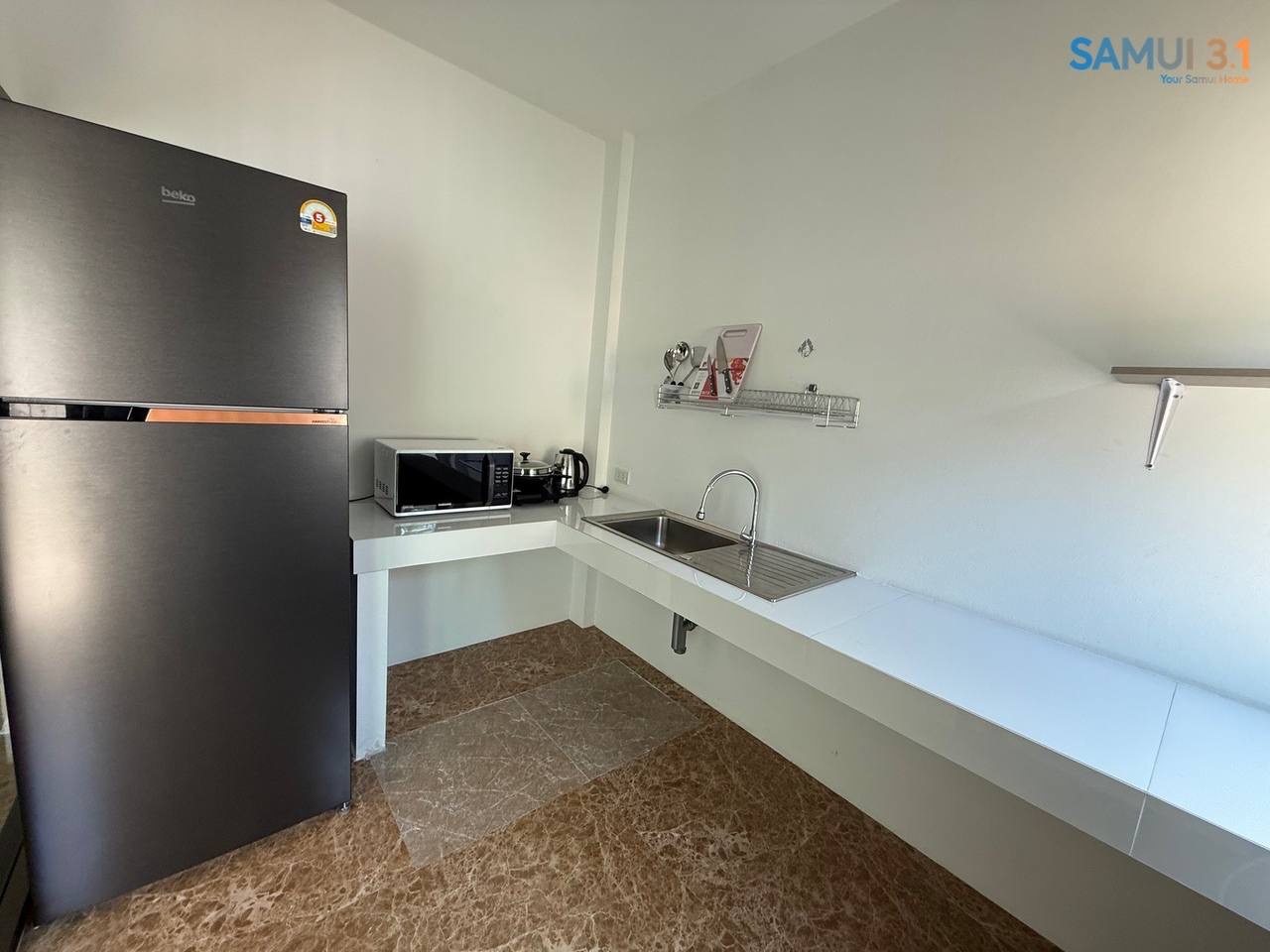 Трехэтажный таунхаус